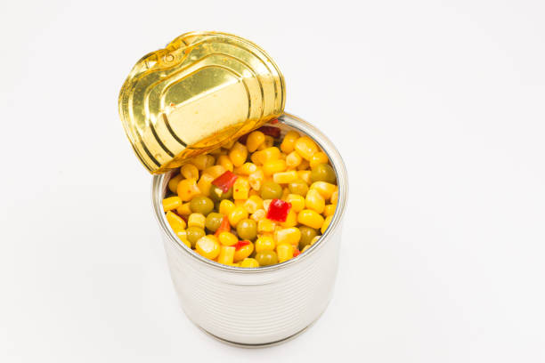 istock Canned food on white background. Sweet corn. 1186698603