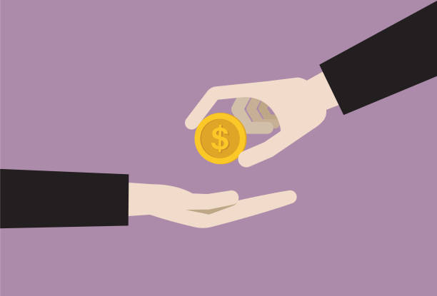 istock Businessman gives a US dollar coin 1186700538