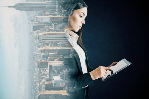 istock Businesswoman with tablet 1186700850