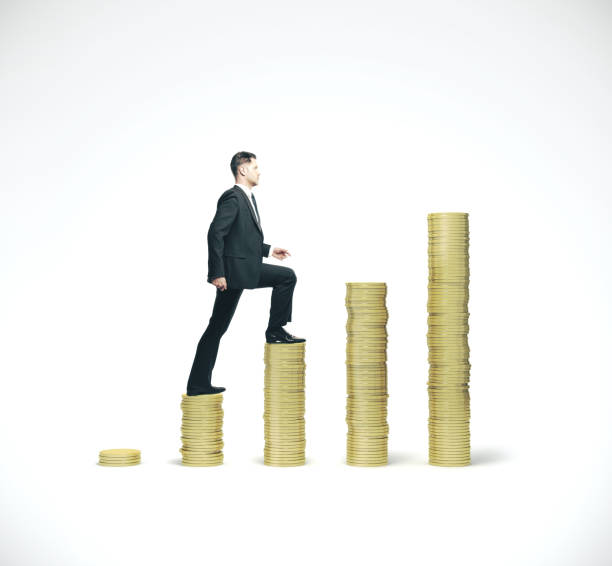 istock Businessman walking on gold coins chart. 1186702495