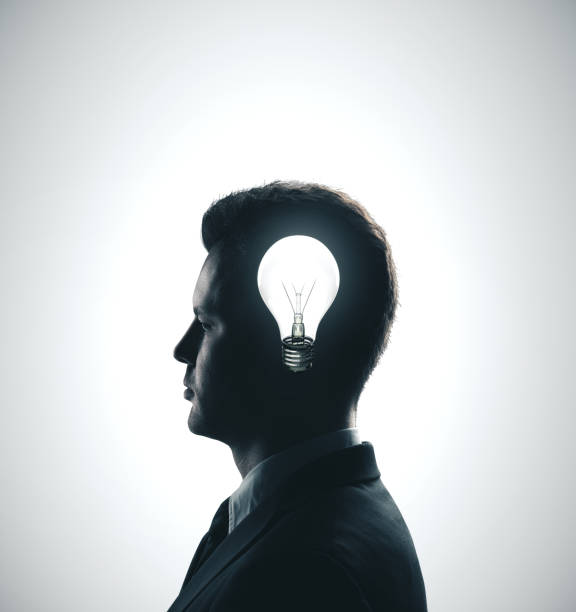 istock businessman with lightbulb in head 1186702616
