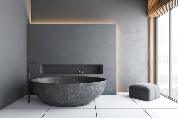 istock Gray minimalistic bathroom with gray tub 1186703257