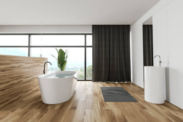 istock Spacious white and wooden bathroom interior 1186703634