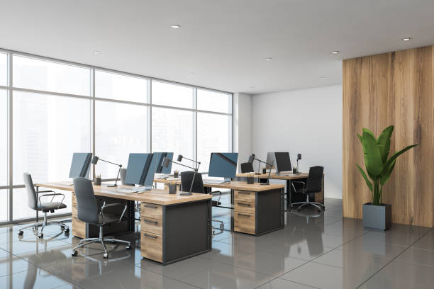 istock White and wooden open space office corner 1186703791