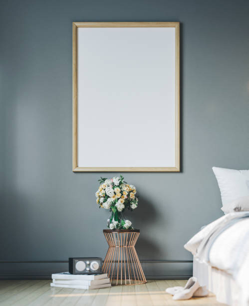 istock Cozy bedroom with empty poster frame. Frame mockup in interior. 1186705885