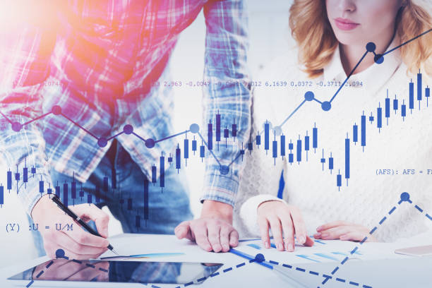 istock Business people working in office, digital charts 1186706744