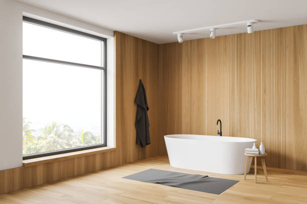 istock White and wooden bathroom corner with tub 1186707370