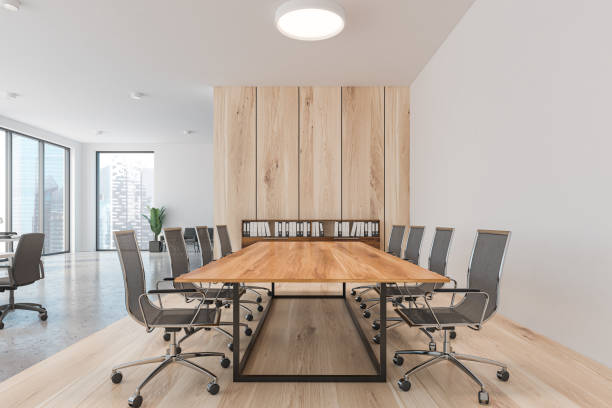 istock White and wooden conference room interior 1186708012
