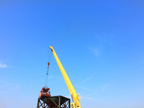 istock Large yellow scoop Are scooping chemical fertilizer 1186708475