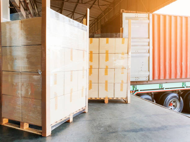 istock Close up hand pallet truck at warehouse 1186710153