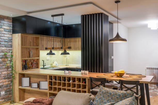 istock Kitchen and dining area in open plan apartment interior 1186710661