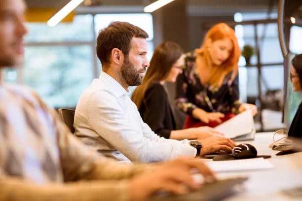 istock Young business people working in office 1186715544