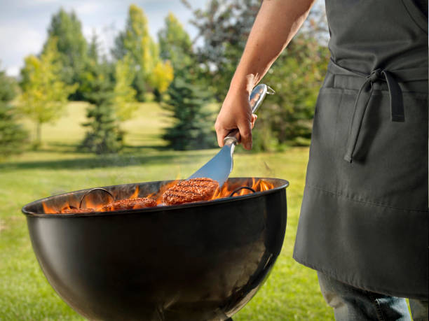 istock Cooking Burgers on a Backyard BBQ 1186718136