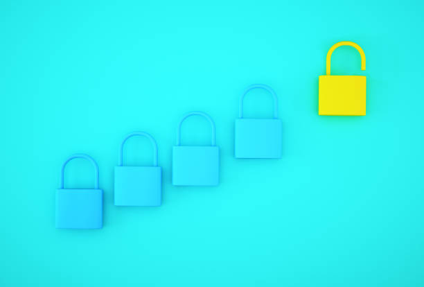 istock Outstanding yellow key unlock standing one different from the others on blue background. Successful business team leader concept. 1186721792