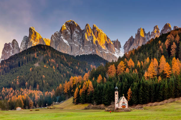 Tourist at San Giovanni Church in front of odle group, Trentino Alto Adige region, Italy Dolomites, Italy, Church, Funes Valley, Mountain dolomites stock pictures, royalty-free photos & images