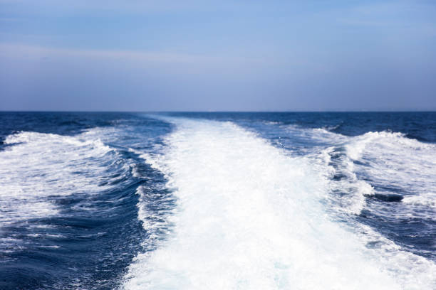 istock Water splash behind the  speed boat in the ocean 1186723632
