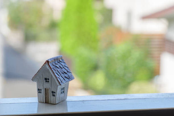 Miniature house in the sunset