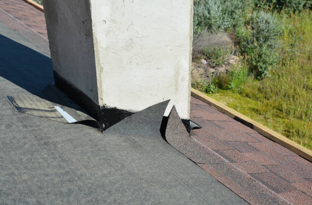 istock Asphalt shingles roofing construction in chimney roof problem area. Roofing construction close up. 1186727874