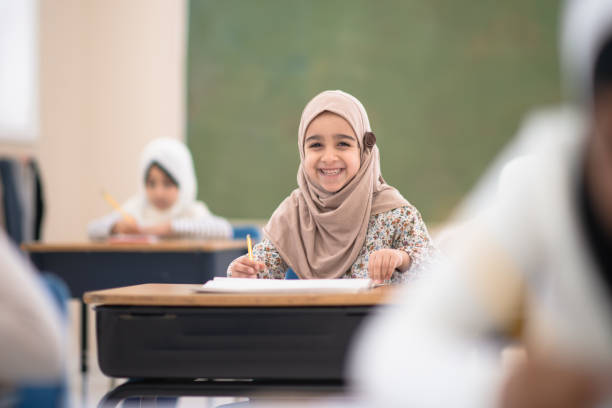 istock Muslim Elementary Student at Her Desk stock photo 1186730196