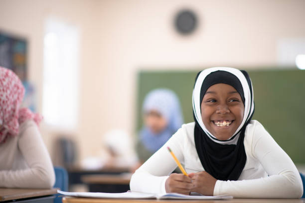 istock African Muslim Student Writing in Class stock photo 1186730201