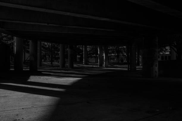 Black and White Under Highway stock photo