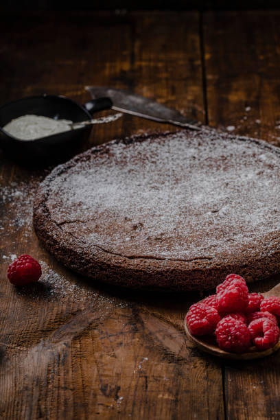 istock Chocolate mud cake swedish kladdkaka or sticky chocolate cake with raspberries 1186734010