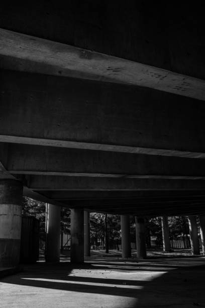 Black and White Underneath Highway stock photo