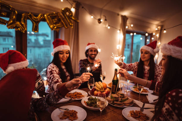 istock people have fun at dinner for christmas 1186735209