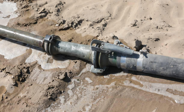 istock iron pipe for irrigation with a water leak and waste on the arid 1186736046