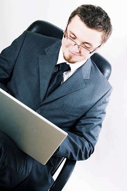 istock beauty young man with laptop 118674027