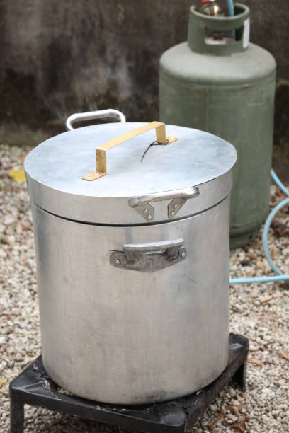 istock big cauldron and the gas cylinder 1186749646