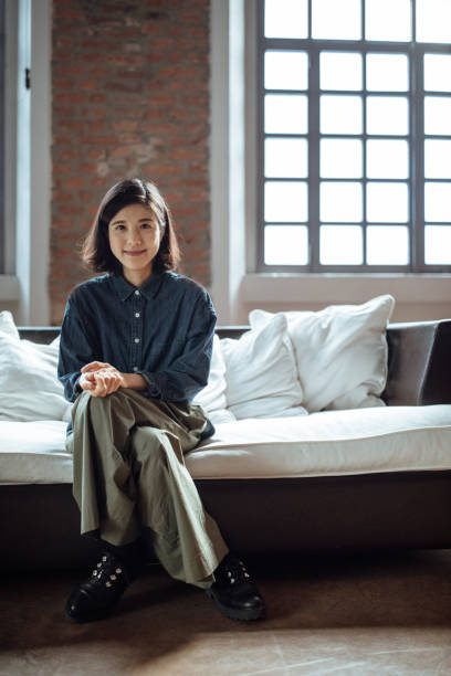 istock Beautiful young woman at home 1186750384