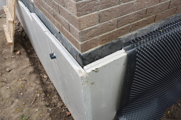 istock Foundation insulation and Damp proofing in problem corner area. House basement, foundation insulation details with waterproofing and Damp Proof membranes 1186751748