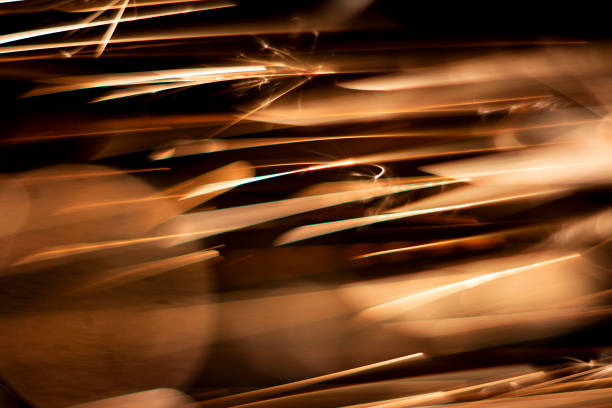 istock abstract close-up image of blurred sparks and smoke from arc welding with bokeh effect 1186751749