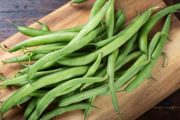 istock raw fresh asparagus beans on a cutting board 1186752154