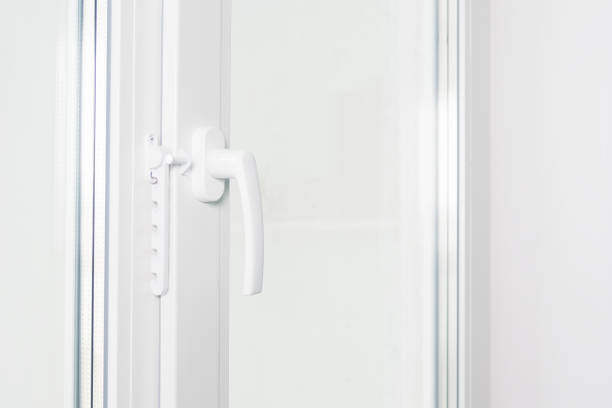 istock close-up of the handle of a new white plastic window 1186755052