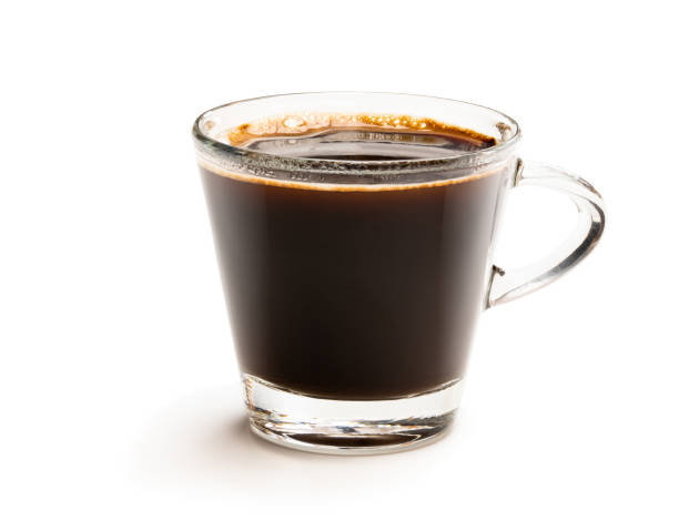 istock Black coffee in glass cup isolated on white 1186758296
