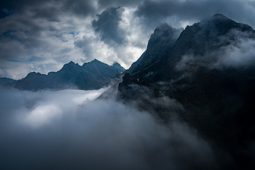 Rysy peak in the high Tatra mountain in foggy day. Tatras National Park Poland