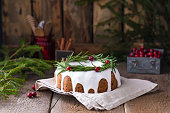 Traditional homemade Christmas fruit cake on the wooden background