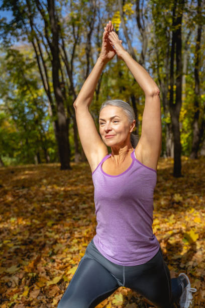 istock Female yogi performing a crescent lunge asana 1186763732
