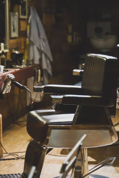istock Empty interior of modern hairdressing salon. 1186763854