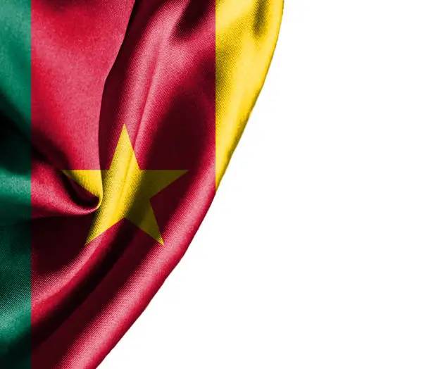 Photo of Cameroon waving silky flag isolated on white background