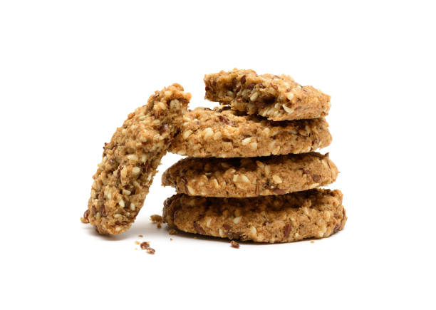 pila di biscotti ai cereali - oat oatmeal isolated stack foto e immagini stock
