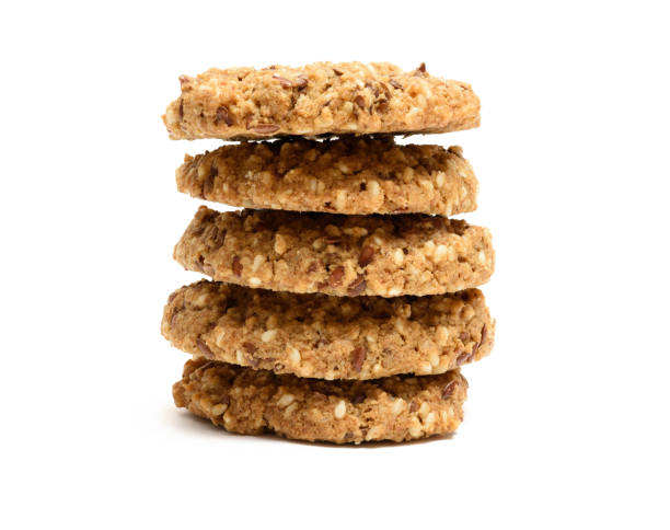 pila di biscotti ai cereali - oat oatmeal isolated stack foto e immagini stock