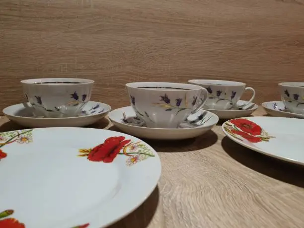 Tea-set. Porcelain tableware set. Plates and cups.