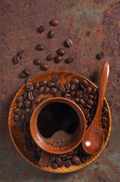 istock Tasty coffee cup and beans 1186772789