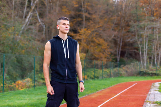 istock Man jogger on the race track 1186773605