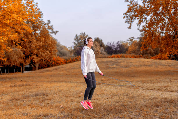 istock Young woman exercising in nature. 1186773891