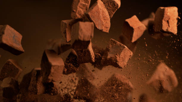 istock Flying pieces of crushed chocolate pieces 1186775557