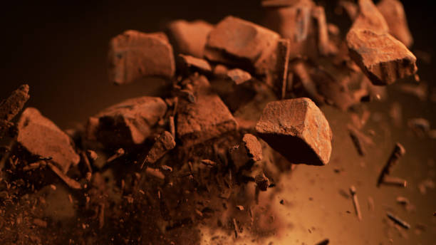 istock Flying pieces of crushed chocolate pieces 1186775620